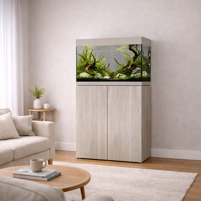 Vista del acuario con mesa Waterbox Eden 40 en color aspen en una habitación