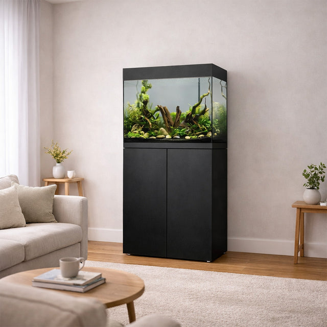 Vista del acuario con mesa Waterbox Eden 30 en color negro en una habitación